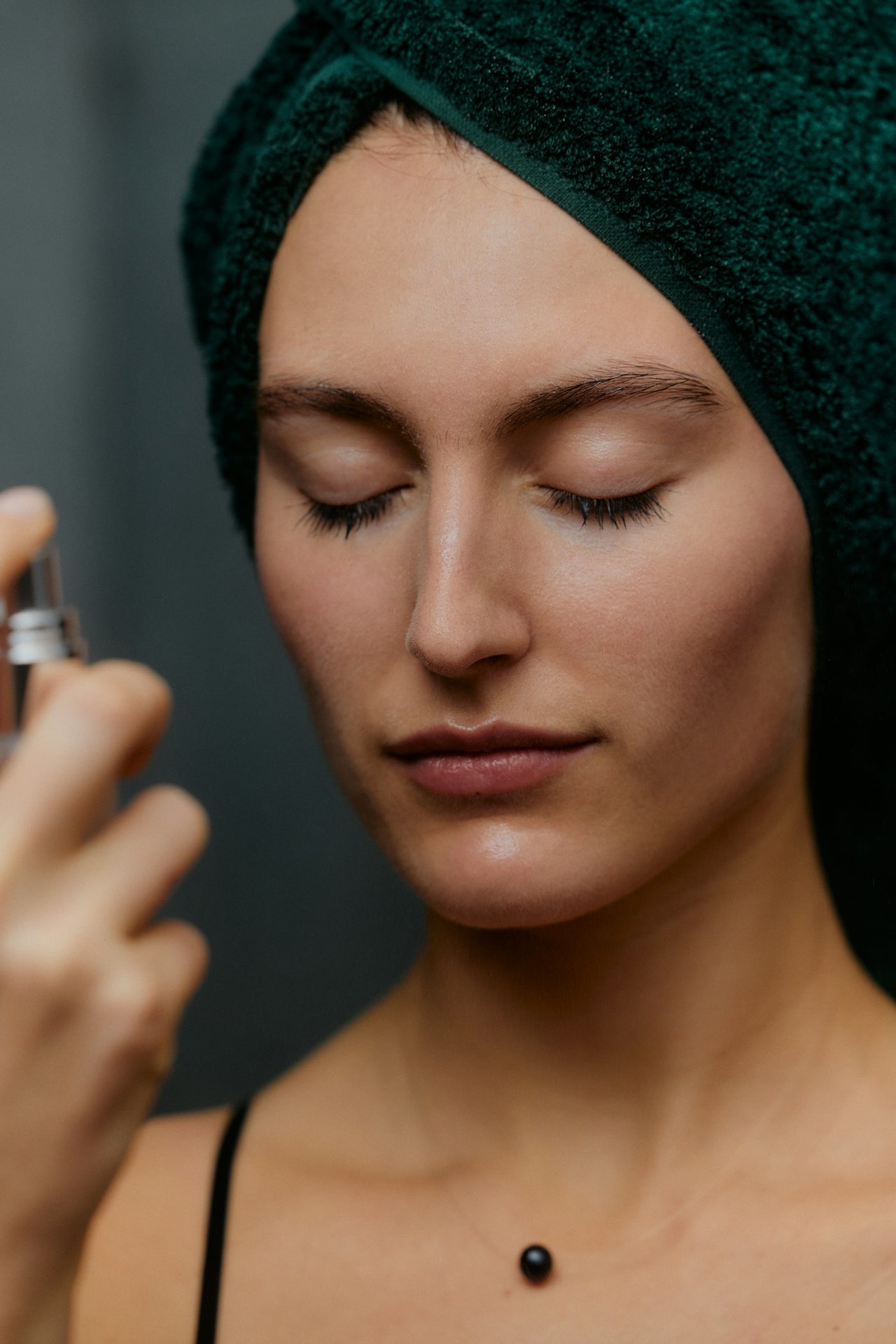 Close-up of improved skin texture from C-HIT collagen-building exosome serum reducing scars and dark spots.