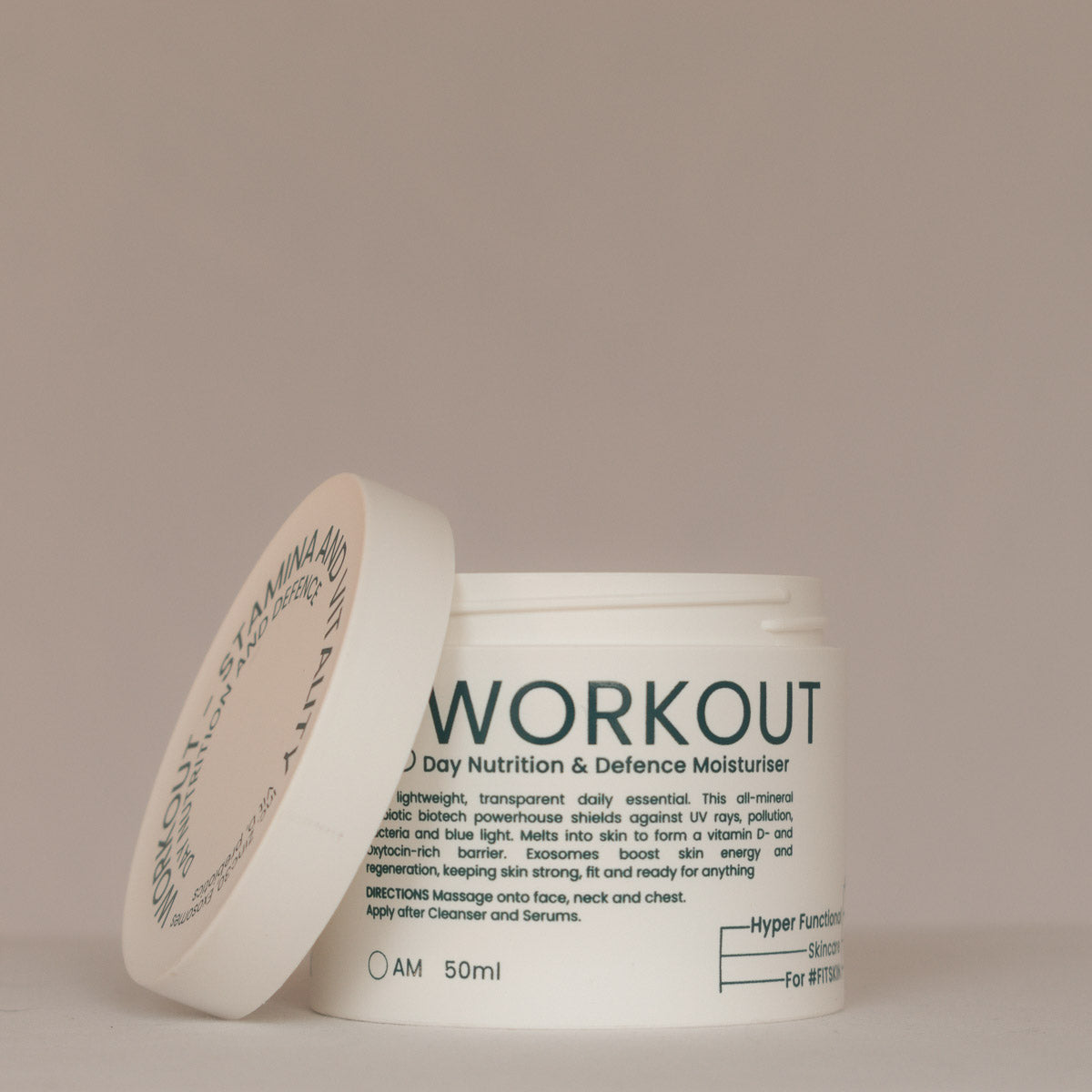 White jar labeled 'Workout' on a beige background