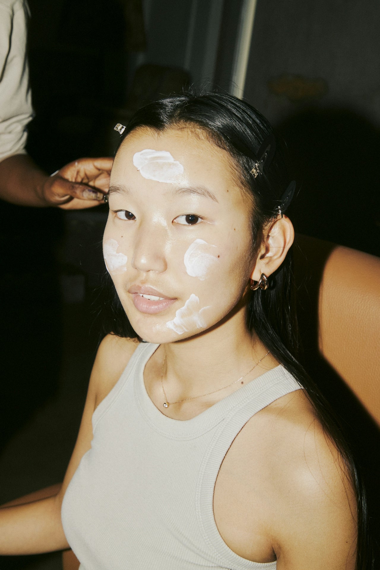 Applying hyper-functional skincare from home compostable biodegradable jar.