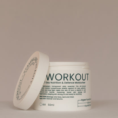White jar labeled 'Workout' on a beige background